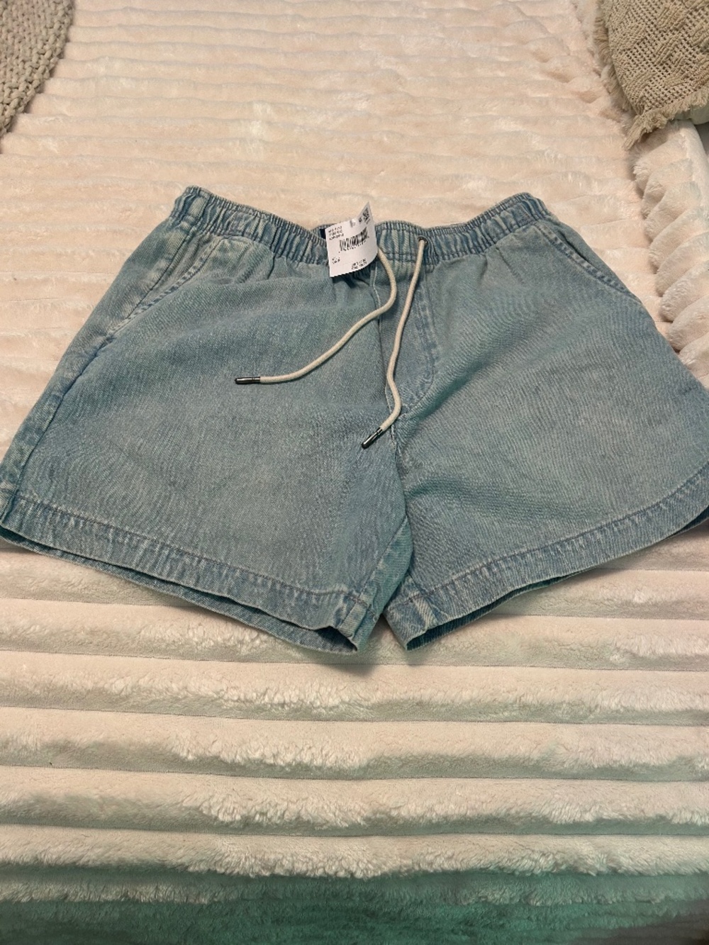 Gender neutral jean shorts.